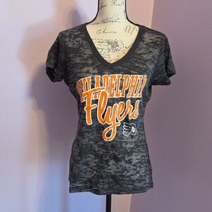NHL Women's Black and Orange Camouflage V-Neck Tee